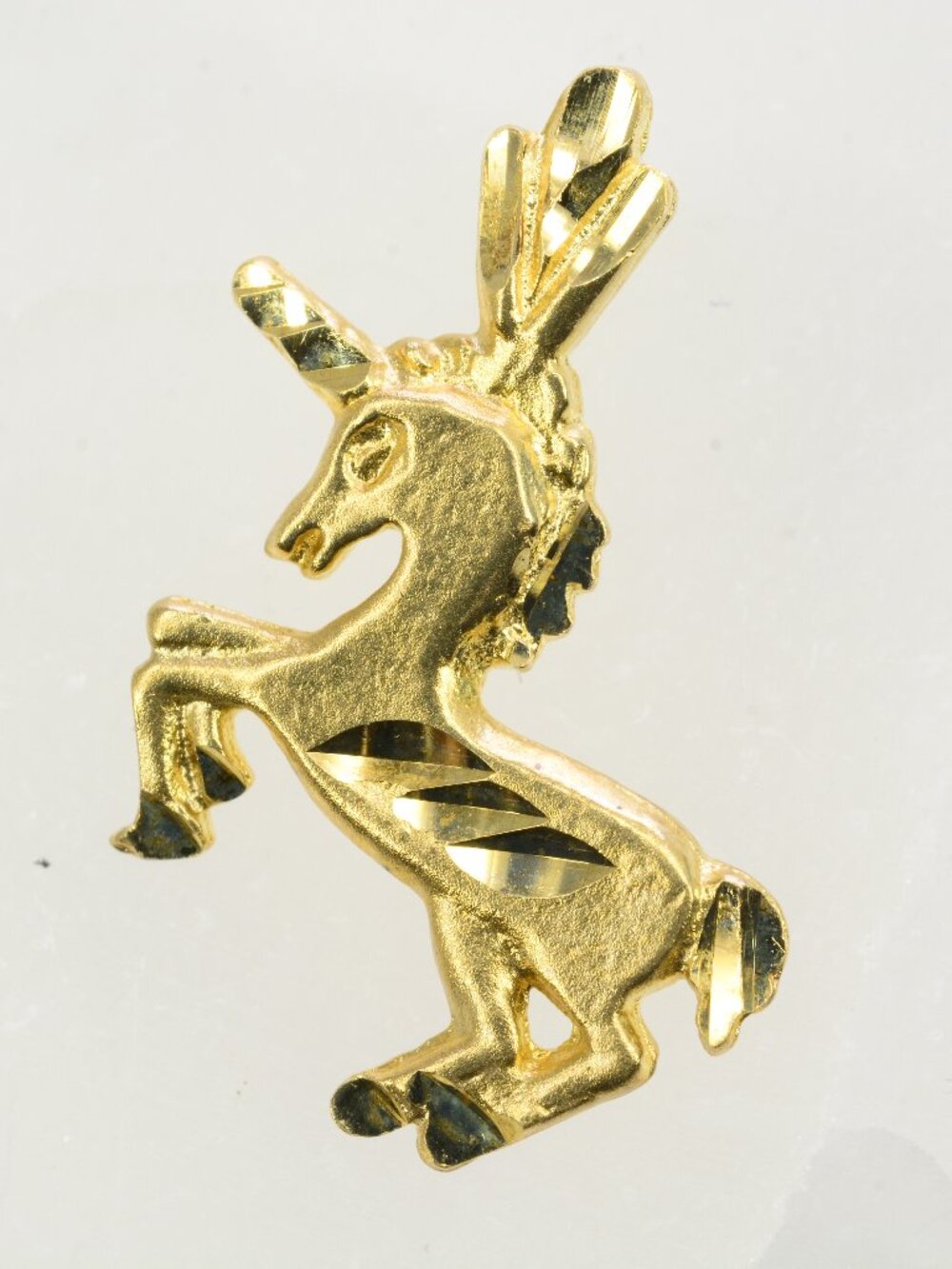 10k Vintage Diamond Cut Unicorn